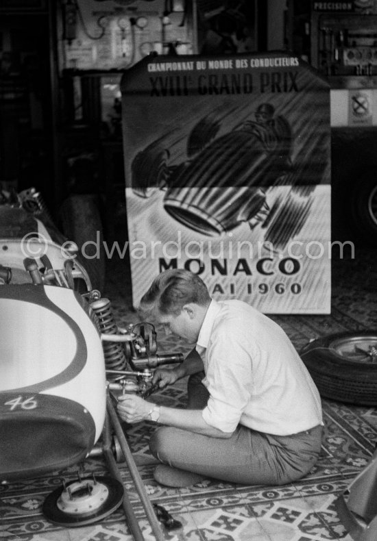 In a backstreet garage of Monte Carlo, Lance Reventlow, the driver-owner-constructor, helps to prepare his Scarab car (46) for the race. Monaco Grand Prix 1960. - Photo by Edward Quinn