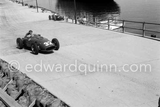 Cliff Allison, (32) Ferrari 246, on right Joakim Bonnier\'s N° 2 B.R.M. P48. Monaco Grand Prix 1960. - Photo by Edward Quinn