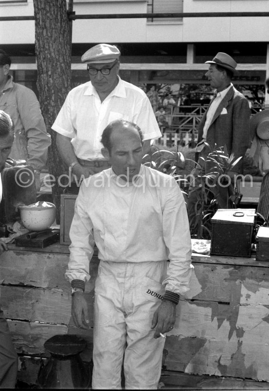 Stirling Moss. His father in the background. Monaco Grand Prix 1960. - Photo by Edward Quinn