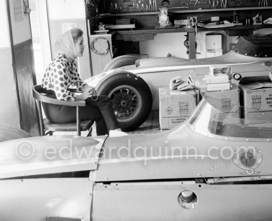 Jill St. John in a backstreet garage of Monte Carlo, where her husband Lance Reventlow, and his team prepare the Scarab cars for the race. Monaco Grand Prix 1960. - Photo by Edward Quinn