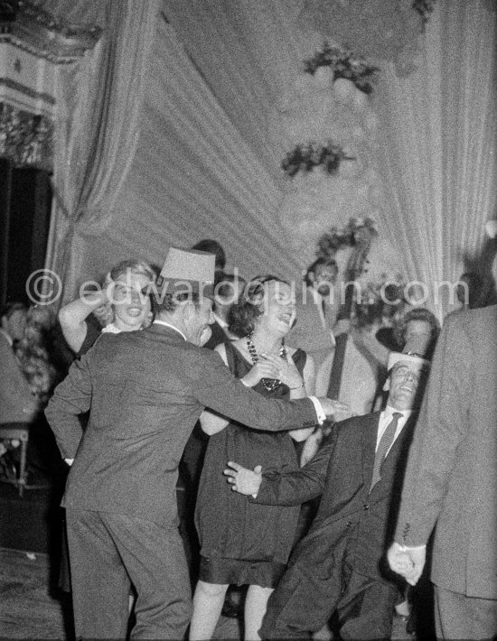 Stirling Moss, winner of the Grand Prix, Swedish model Helga Mayerhoffer, Chris Bristow and a friend. Gala of Monaco Grand Prix 1960.Chris Bristow, Gala. Monaco Grand Prix 1960. - Photo by Edward Quinn