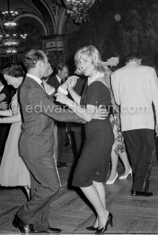 Stirling Moss, winner of the Grand Prix, gets into the party spirit as he dances with Swedish model Helga Mayerhoffer. Gala of Monaco Grand Prix 1960. - Photo by Edward Quinn