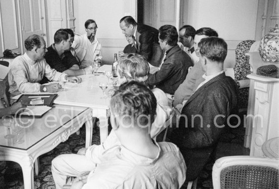 Stirling Moss as chairman addresses the inaugural meeting of a new racing drivers association (Grand Prix Drivers’ Association) in room 183 of Monte Carlo\'s hotel Metropole. On his left vice chairman Joakim Bonnier, hidden Jim Clark, and Masten Gregory. Right back to camera John Surtees. Back right Maurice Trintignant, Olivier Gendebien, Dan Gurney and Henry Taylor. Monaco Grand Prix 1961. - Photo by Edward Quinn