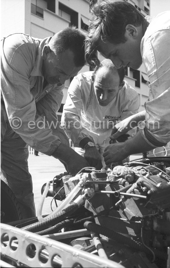 Stirling Moss, (20) Lotus-Climax. Alf Francis (left), chief mechanic of Rob Walker Racing Team. Monaco Grand Prix 1961. - Photo by Edward Quinn