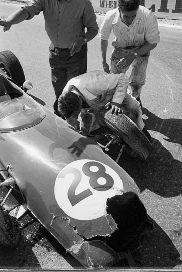 Practice saw Jim Clark crash his Lotus heavily at Ste Devote. Monaco Grand Prix 1961. - Photo by Edward Quinn