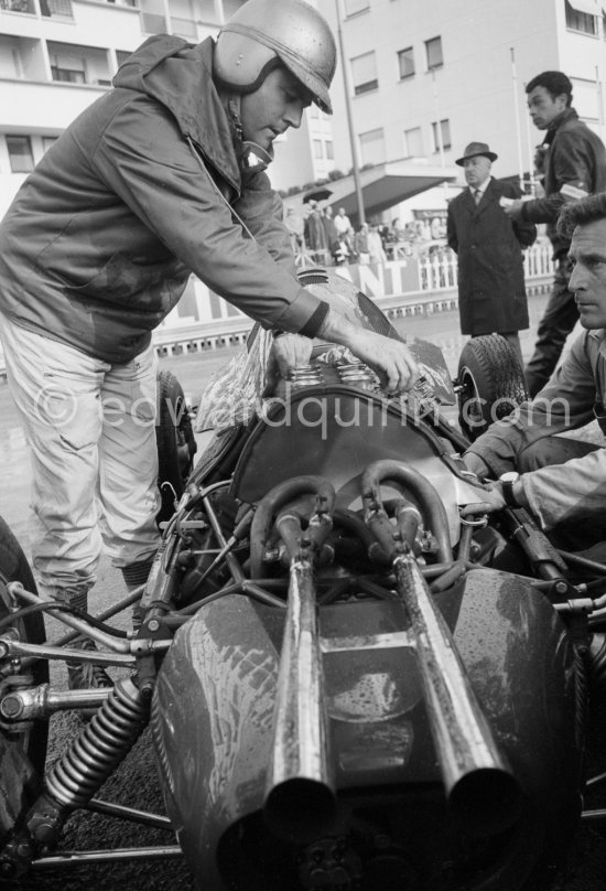 Jack Brabham, (22) Lotus 24, in trouble with a water-logged engine. Monaco Grand Prix 1962. - Photo by Edward Quinn