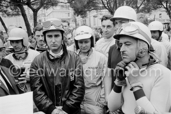 Driver briefing by Louis Chiron. From left: Trevor Taylor, Graham Hill, Lorenzo Bandini, Willy Mairesse, Bruce McLaren, Roy Salvadori, Joakim Bonnier, Maurice Trintignant, Phil Hill. Monaco Grand Prix 1962. - Photo by Edward Quinn
