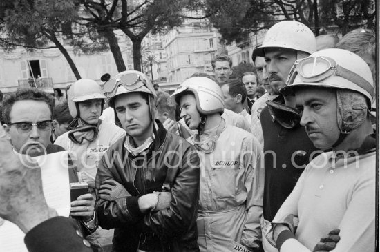 Driver briefing by Louis Chiron. From left: Trevor Taylor, Lorenzo Bandini, Bruce McLaren, Roy Salvadori, Joakim Bonnier, Maurice Trintignant. Monaco Grand Prix 1962. - Photo by Edward Quinn