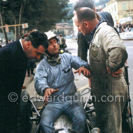 Phil Hill (9) Cooper T73, discussing with John Cooper (left) and mechanics. Monaco Grand Prix 1964. - Photo by Edward Quinn