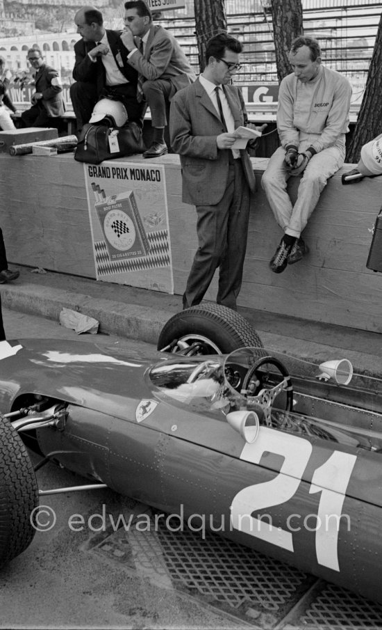 Ferrari racing director Mauro Forghieri with John Surtees, (21) Ferrari 158. Monaco Grand Prix 1964. - Photo by Edward Quinn