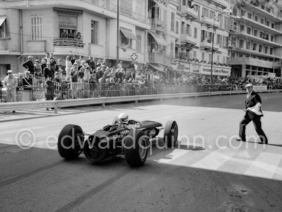 Jackie Stewart, (4) BRM P261. Louis Chiron waves the flag. Monaco Grand Prix 1965. - Photo by Edward Quinn