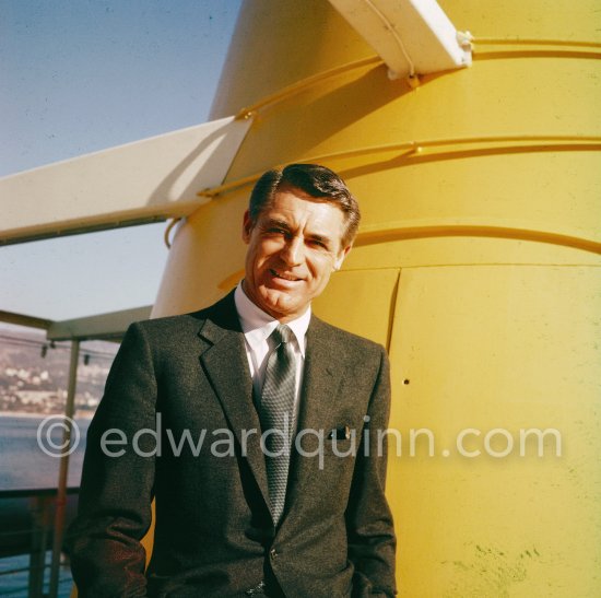 Cary Grant on board Onassis\' yacht Christina. Monaco harbor 1957. - Photo by Edward Quinn