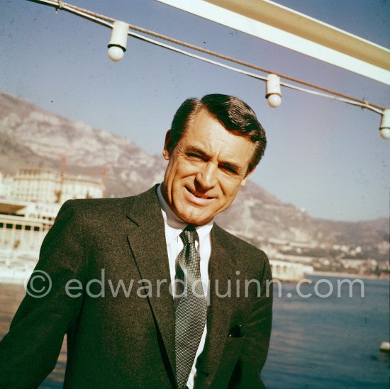 Cary Grant on board Onassis\' yacht Christina. Monaco harbor 1957. - Photo by Edward Quinn