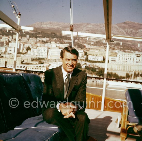 Cary Grant on board Onassis\' yacht Christina. Monaco harbor 1957. - Photo by Edward Quinn