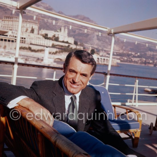 Cary Grant on board Onassis\' yacht Christina. Monaco harbor 1957. - Photo by Edward Quinn