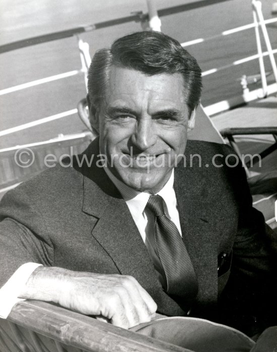 Cary Grant on board Onassis\' yacht Christina. Monaco harbor 1957. - Photo by Edward Quinn