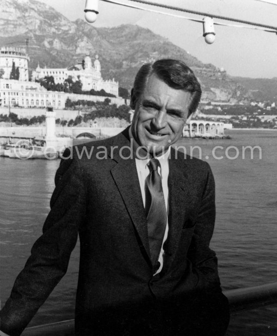 Cary Grant on board Onassis\' yacht Christina. Monaco harbor 1957. - Photo by Edward Quinn