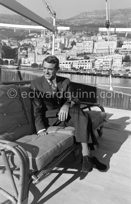 Cary Grant on board Onassis\' yacht Christina. Monaco harbor 1957. - Photo by Edward Quinn