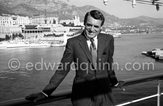 Cary Grant on board Onassis\' yacht Christina. Monaco harbor 1957. - Photo by Edward Quinn