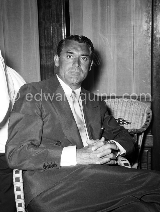 Cary Grant at a Cocktail Party given by Alfred Hitchcock for "To catch a Thief". Cannes 1954. - Photo by Edward Quinn