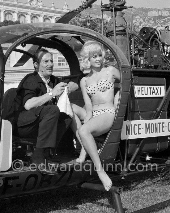 Val Guest, British writer-director-producer and British actress Janette Scott, relaxing in a helicopter during the filming of "The Beauty Jungle". Monte Carlo 1963. - Photo by Edward Quinn