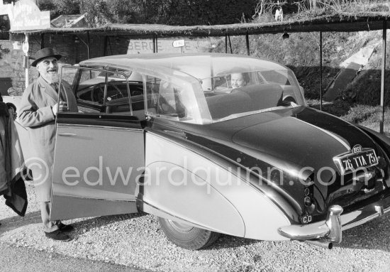 Nubar Gulbenkian and his wife. Armenian oil magnate. His father Caloust was named Mister 5 Percent (Iraq Petroleum Company). Eden Roc, Cap d’Antibes 1959. Car: 1956 Rolls-Royce Silver Wraith, #LELW74, Allweather Tourer with "Perspex" top by Hooper (due to his claustrophopia) and air conditioning. Detailed info on this car by expert Klaus-Josef Rossfeldt see About/Additional Infos. - Photo by Edward Quinn