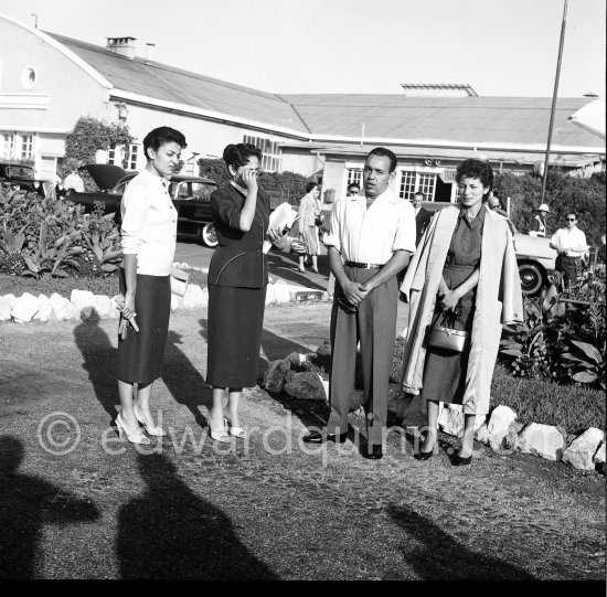 Moulay Hassan (later King Hassan II of Morocco), his sisters Malika, Nezla, Aicha. Nice Airport 1956. - Photo by Edward Quinn