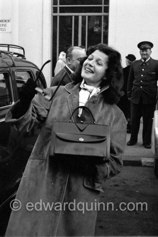 Rita Hayworth. Cannes railway  station 1955. - Photo by Edward Quinn