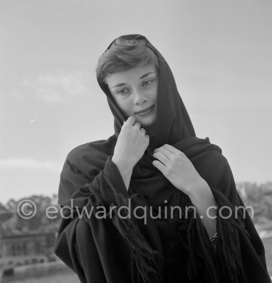 Hollywood actress Audrey Hepburn, before she found fame, at the harbor of Monaco 1951. - Photo by Edward Quinn