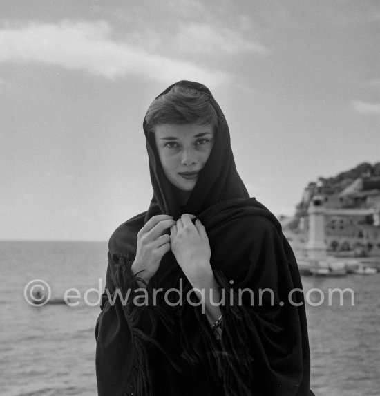 Hollywood actress Audrey Hepburn, before she found fame, at the harbor of Monaco 1951. - Photo by Edward Quinn