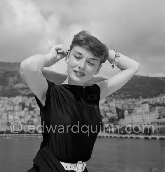 Hollywood actress Audrey Hepburn, before she found fame, at the harbor of Monaco 1951. - Photo by Edward Quinn