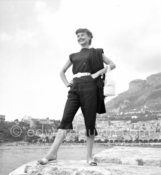 Hollywood actress Audrey Hepburn, before she found fame, at the harbor of Monaco 1951. - Photo by Edward Quinn