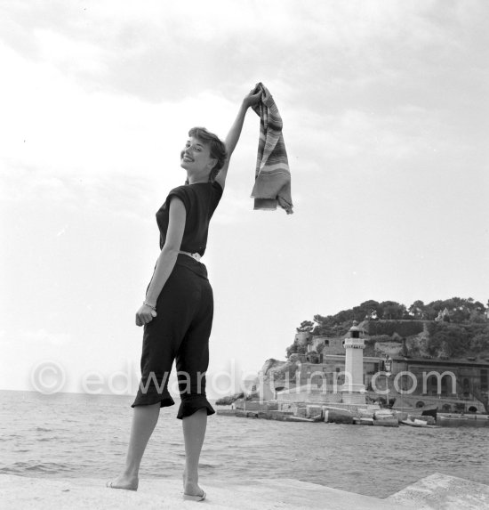 Hollywood actress Audrey Hepburn, before she found fame, at the harbor of Monaco 1951. - Photo by Edward Quinn