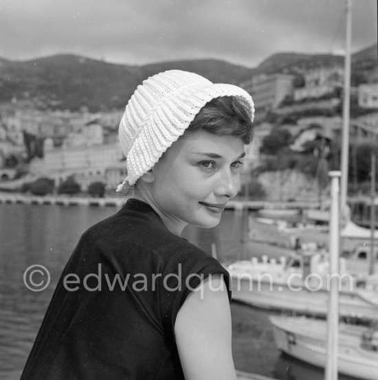 Hollywood actress Audrey Hepburn, before she found fame, at the harbor of Monaco 1951. - Photo by Edward Quinn