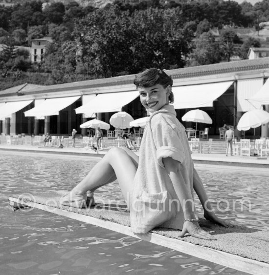 Audrey Hepburn in Monaco for the film "Monte Carlo Baby". She was at the beginning of her career and willingly posed for the photographer. Monte Carlo Beach 1951. - Photo by Edward Quinn