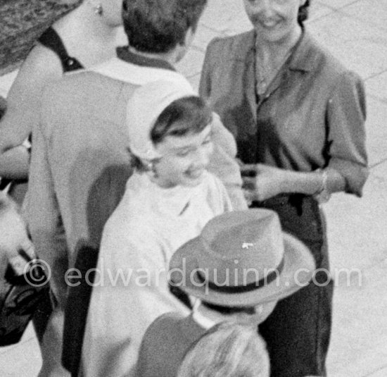 Audrey Hepburn (on the left with white hat) during filming of "Monte Carlo Baby" (french version: "Nous irons à Monte Carlo"). Hotel de Paris, Monte Carlo 1951. Wikipedia "It featured an early performance by Audrey Hepburn playing a spoiled actress. Most Hepburn biographies indicate that it was during the filming of this movie that Hepburn was first discovered by the playwright Colette and chosen for the lead role in the play Gigi, which would lead to Hepburn launching her acting career in Hollywood." - Photo by Edward Quinn