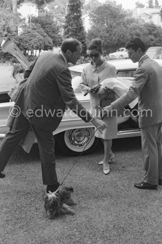 Audrey Hepburn and Mel Ferrer with their little dog. Cap d\'Antibes, Eden Roc 1960. Car: 1960 Chevrolet Bel Air Sport Sedan - Photo by Edward Quinn