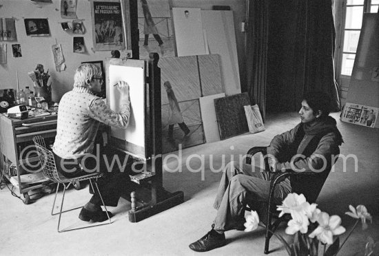 David Hockney working on the drawing "Carlos" at his studio in Paris 1975. - Photo by Edward Quinn