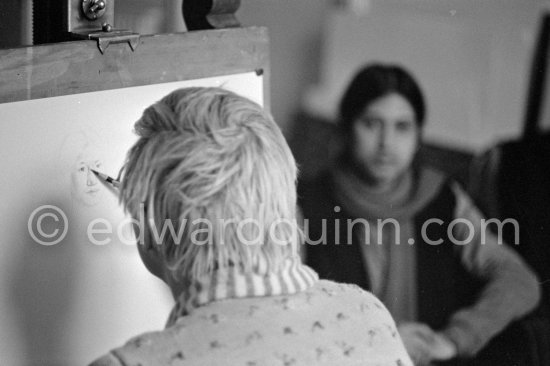 David Hockney working on the drawing "Carlos" at his studio in Paris 1975. - Photo by Edward Quinn