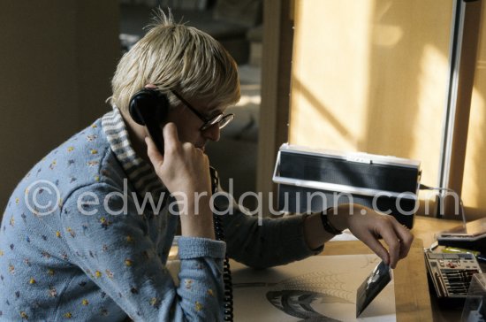 David Hockney working on the set design for "The Rake's Progress" at England’s Glyndebourne Opera Festival Paris 1975. - Photo by Edward Quinn