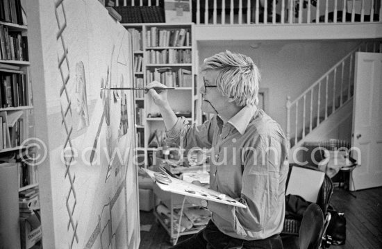 David Hockney working on "Self portrait with blue guitar". London 1977. - Photo by Edward Quinn