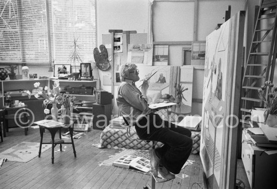 David Hockney working on "Self portrait with blue guitar". London 1977. - Photo by Edward Quinn