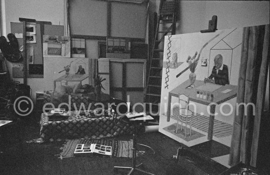 "Self portrait with blue guitar" and "Sleeping beauty: Model with Unfinished Self-Portrait" in David Hockney\'s Studio 1977. - Photo by Edward Quinn