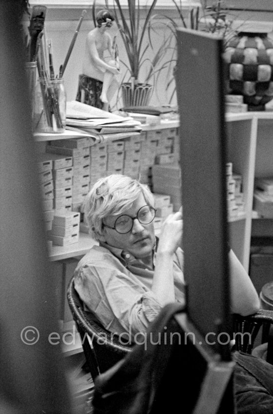 David Hockney at his studio, London 1977. - Photo by Edward Quinn