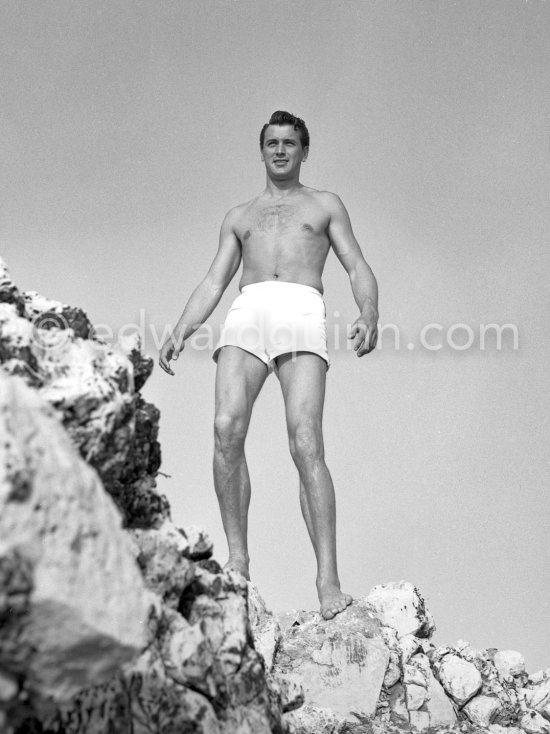 Rock Hudson on holiday at Cap d’Antibes. Until 1947 Hudson worked on odd jobs, finally in 1954, with the film "Magnificent Obsession", he was accepted as an actor and in 1957 he was a nominee for an Oscar for "Giant". Eden Roc 1954. - Photo by Edward Quinn