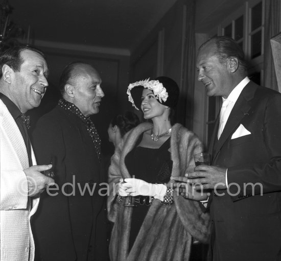 Charles Boyer, Georges Simenon, Curd Jürgens and Eva Bartok. Cannes Film Festival 1957. - Photo by Edward Quinn