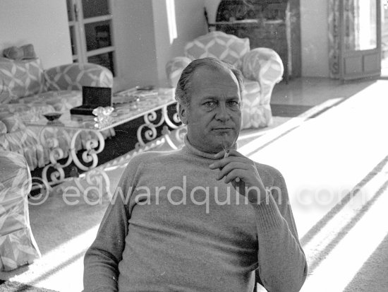 Curd Jürgens, who was the highest-paid actor in Europe, in the living room of his Villa Canzone della Mare, at Saint-Jean-Cap-Ferrat 1955. - Photo by Edward Quinn