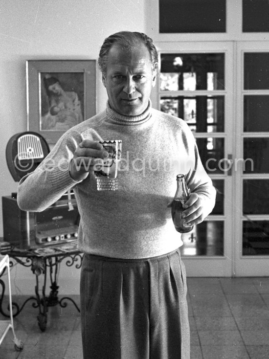 Curd Jürgens, who was the highest-paid actor in Europe, in the living room of his Villa Canzone della Mare, at Saint-Jean-Cap-Ferrat 1955. - Photo by Edward Quinn