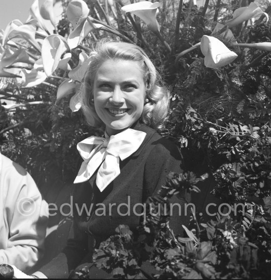 Grace Kelly at the battle of flowers. Cannes Film Festival. Cannes 1955. - Photo by Edward Quinn