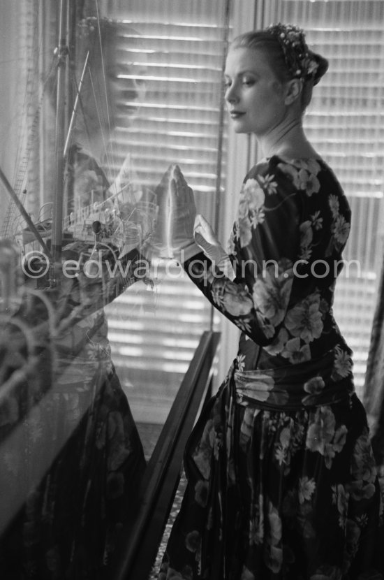 Grace Kelly (later to become Princess Grace) at the Royal Palace just before she met Prince Rainier for the first time. One of Prince Rainier’s personal servants, Michel Demorizi, guided her around some of the great number of rooms of the Royal Palace. Monaco 1955. - Photo by Edward Quinn